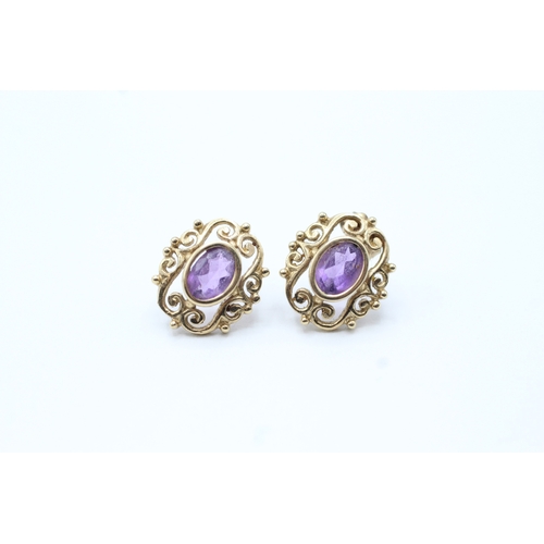 119 - 9ct gold amethyst stud earrings (1.3g)