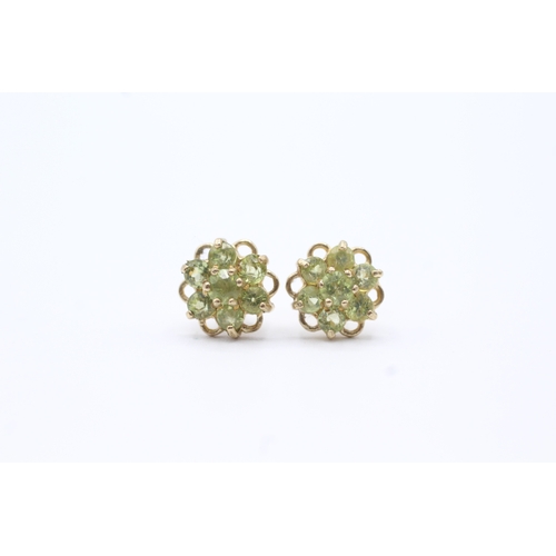 123 - 9ct gold peridot floral halo earrings (1.2g)