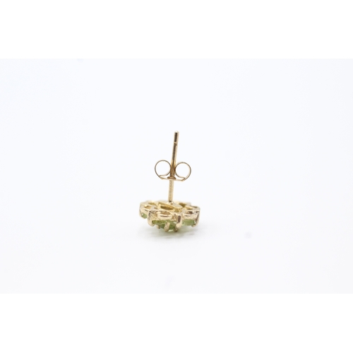 123 - 9ct gold peridot floral halo earrings (1.2g)