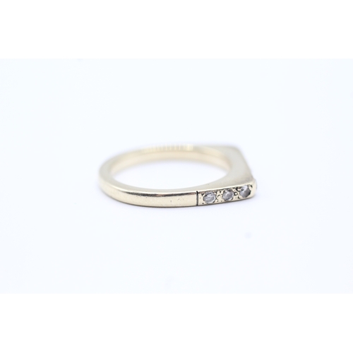 127 - 9ct gold diamond geometric ring (3.8g) Size N