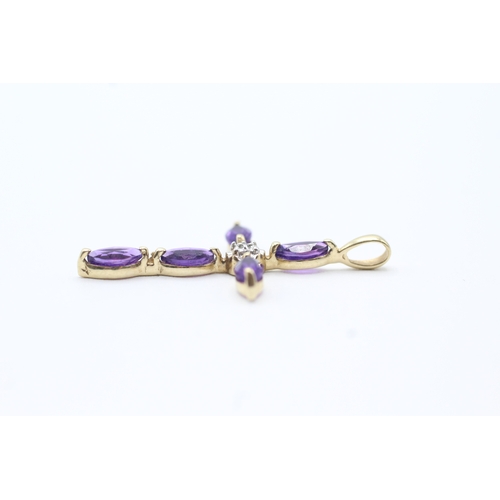 132 - 9ct gold amethyst and diamond cross pendant (1.1g)