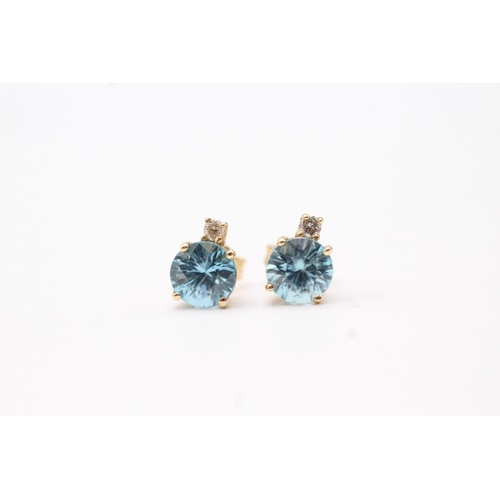 135 - 9ct gold diamond and blue gemstone stud earrings (1.5g)