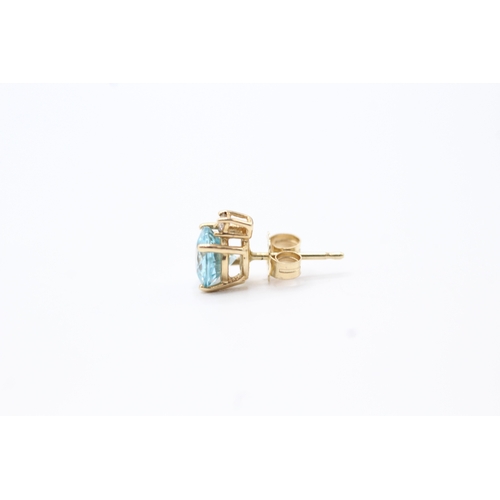 135 - 9ct gold diamond and blue gemstone stud earrings (1.5g)