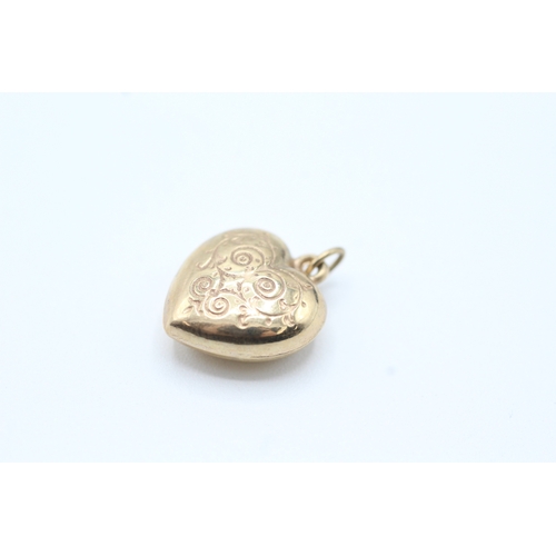 140 - 9ct gold heart charm (0.7g)