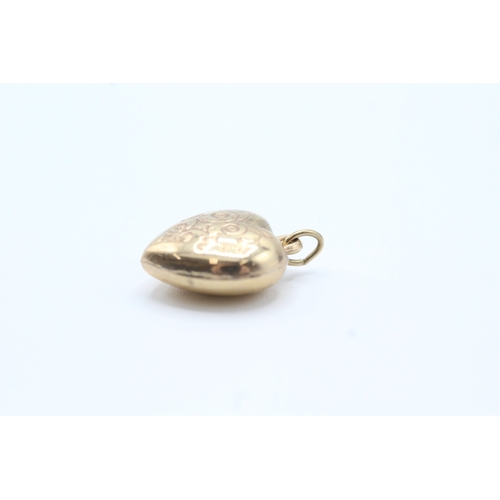 140 - 9ct gold heart charm (0.7g)