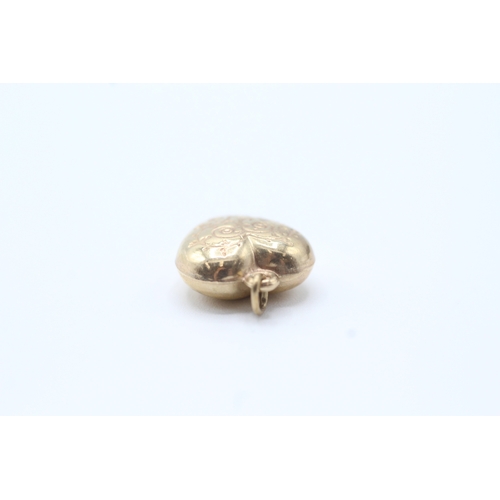 140 - 9ct gold heart charm (0.7g)