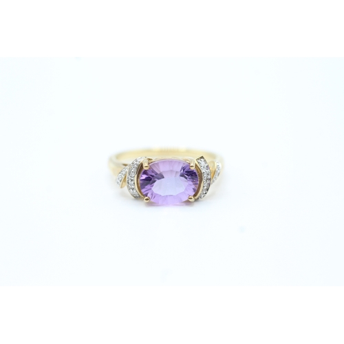 143 - 9ct gold diamond accented amethyst set cocktail ring (3.1g) Size N