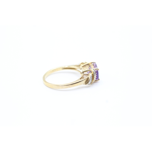 143 - 9ct gold diamond accented amethyst set cocktail ring (3.1g) Size N