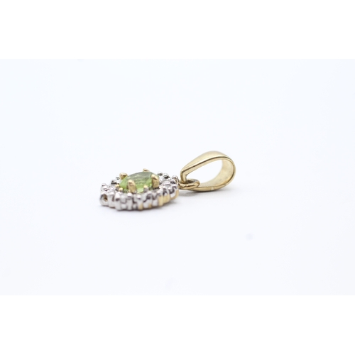 146 - 9ct gold green gemstone and diamond halo pendant (1.6g)