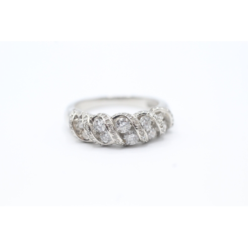 149 - 10kt white gold diamond set band ring - as found, one small diamond missing (3.6g) Size O