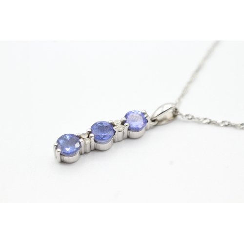 155 - 9ct white gold sapphire and diamonds drop pendant on chain (2.7g)