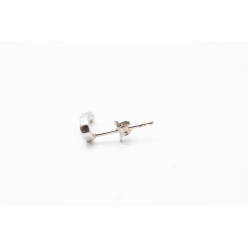 159 - 9ct white gold diamond twist stud earrings (1.2g)