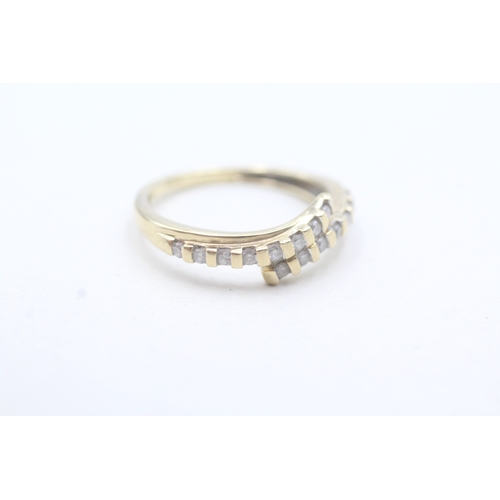 16 - 9ct gold diamond bypass row ring (2.4g) Size N 1/2