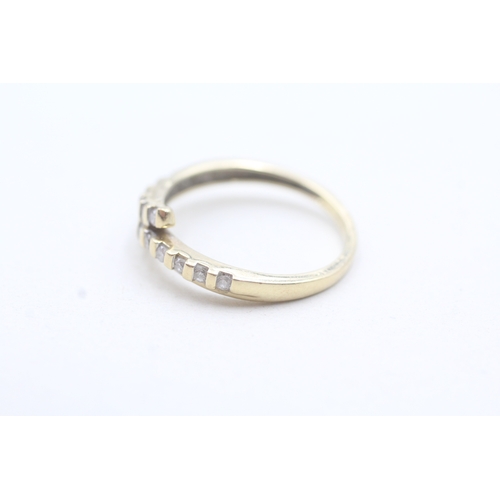 16 - 9ct gold diamond bypass row ring (2.4g) Size N 1/2