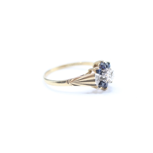 163 - 9ct gold diamond & sapphire cluster dress ring (1.7g) Size N