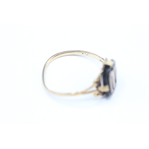 166 - 9ct gold onyx claw clasp with letter 'M' signet ring (1.5g) as seen - misshapen Size N