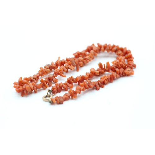 168 - 9ct gold clasped rough cut coral beaded necklace (9.6g)