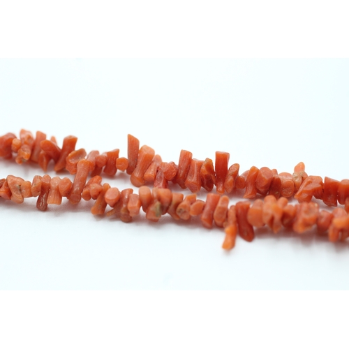 168 - 9ct gold clasped rough cut coral beaded necklace (9.6g)