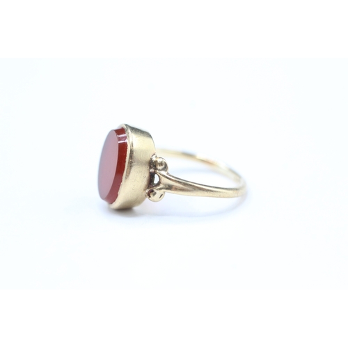 169 - 9ct gold carnelian dress ring (2g) Size F 1/2