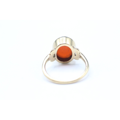 169 - 9ct gold carnelian dress ring (2g) Size F 1/2