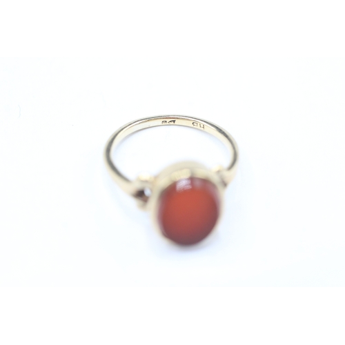 169 - 9ct gold carnelian dress ring (2g) Size F 1/2