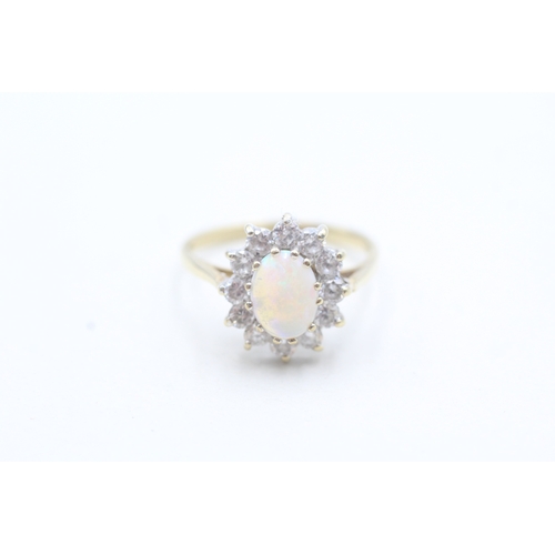 17 - 9ct gold opal and white gemstone halo ring (2.5g) Size N