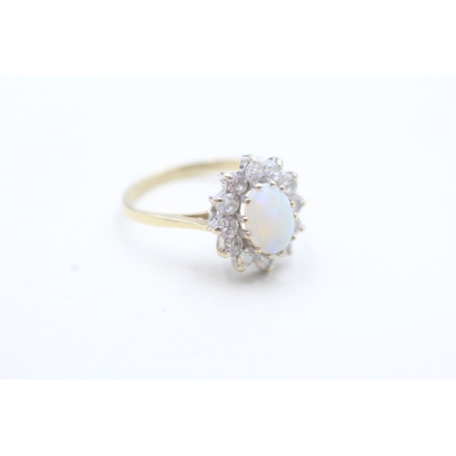 17 - 9ct gold opal and white gemstone halo ring (2.5g) Size N