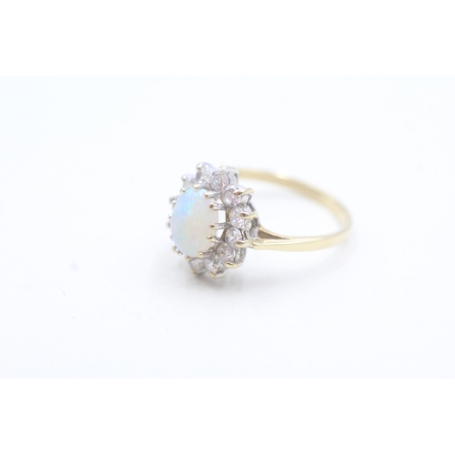 17 - 9ct gold opal and white gemstone halo ring (2.5g) Size N