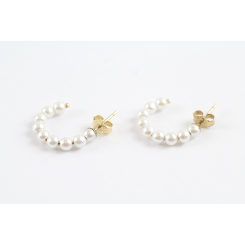 18 - 9ct gold pearl half hoop earrings (0.9g)