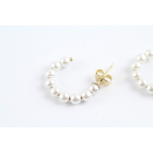 18 - 9ct gold pearl half hoop earrings (0.9g)