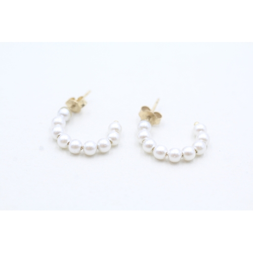 18 - 9ct gold pearl half hoop earrings (0.9g)