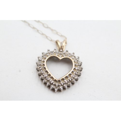 19 - 9ct gold diamond set heart pendant and chain (2.5g)