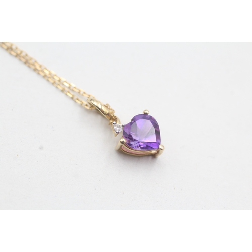 25 - 9ct gold amethyst and diamond heart pendant on chain (1.9g)