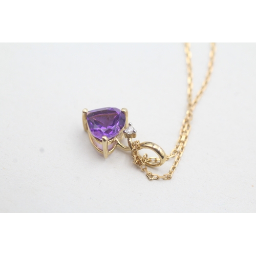 25 - 9ct gold amethyst and diamond heart pendant on chain (1.9g)