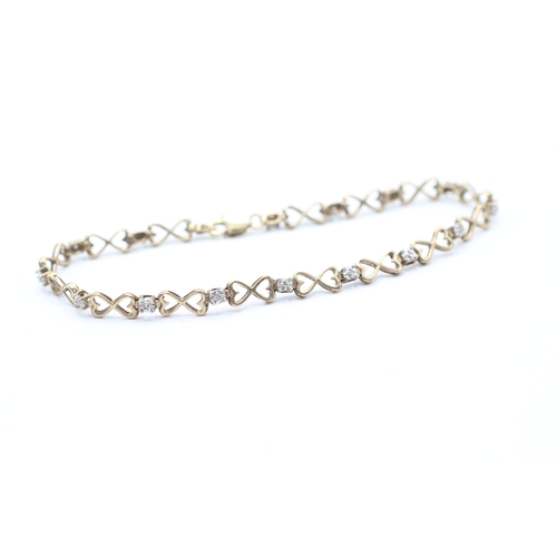 31 - 9ct gold diamond chain bracelet (4.2g)