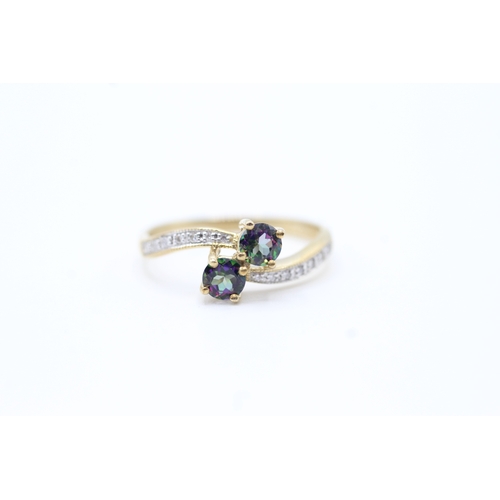 40 - 9ct gold diamond accented mystic topaz set bypass ring (2g) Size P