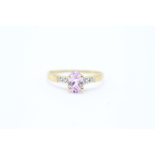 41 - 9ct gold diamond accented pink gemstone set dress ring (1.5g) Size P