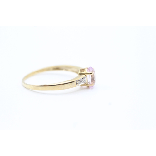 41 - 9ct gold diamond accented pink gemstone set dress ring (1.5g) Size P