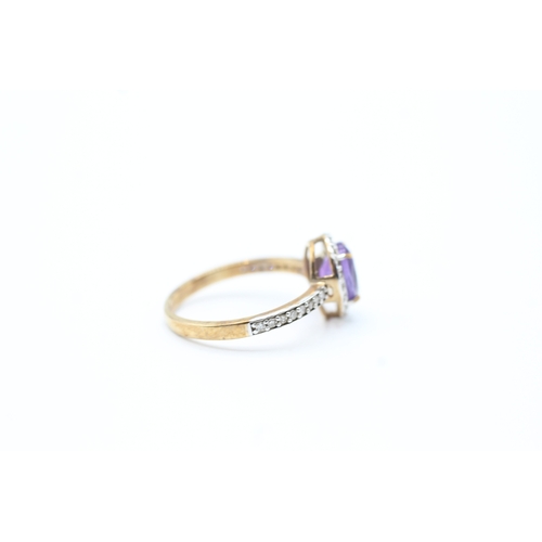 43 - 9ct gold diamond and amethyst set cluster ring (2.2g) Size O