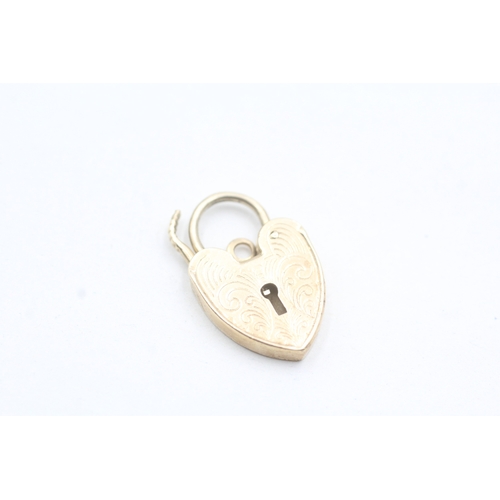 45 - 9ct gold heart lock charm (2.8g)