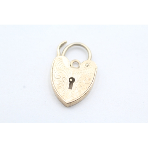 45 - 9ct gold heart lock charm (2.8g)