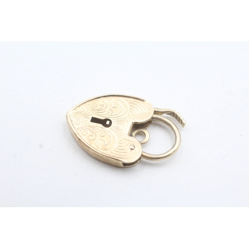 45 - 9ct gold heart lock charm (2.8g)