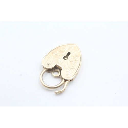 45 - 9ct gold heart lock charm (2.8g)