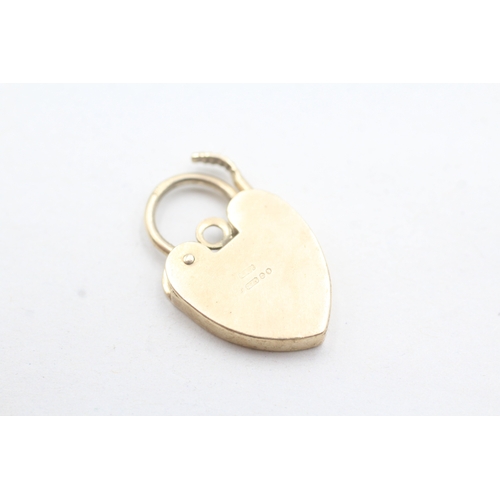 45 - 9ct gold heart lock charm (2.8g)