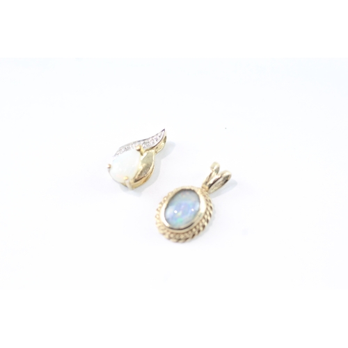 47 - 2x 9ct gold opal, opal triplet & diamond pendants (1.3g)