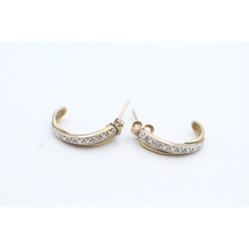 48 - 9ct gold diamond half loop earrings (1.4g)