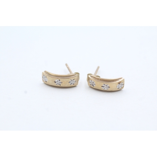 51 - 9ct gold star set diamond curved drop earrings (1.2g)