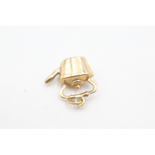 52 - 9ct gold stove kettle charm (0.9g)