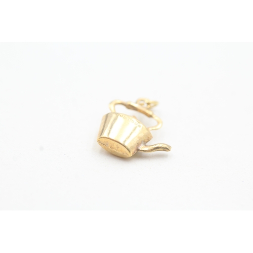 52 - 9ct gold stove kettle charm (0.9g)