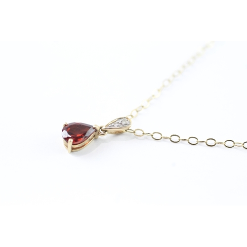 58 - 9ct gold garnet & diamond pendant necklace (1.4g)